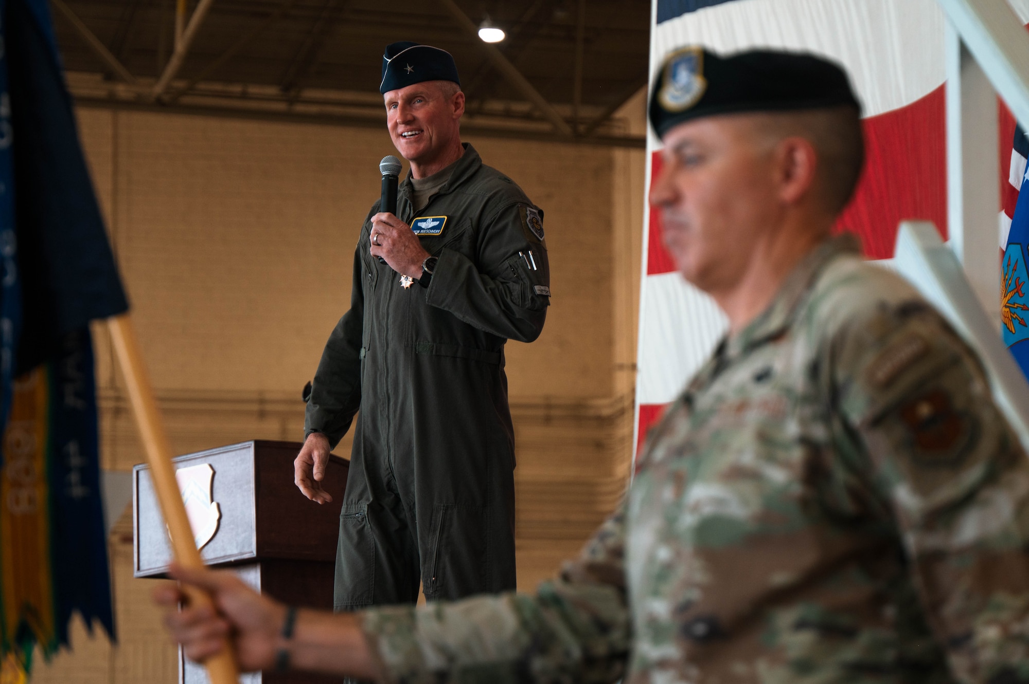 U.S. Air Force Brig. Gen. Jason Rueschhoff, 56th Fighter Wing outgoing commander, speaks at the 56th Fighter Wing Change of Command ceremony, July 1, 2024, at Luke Air Force Base, Arizona.