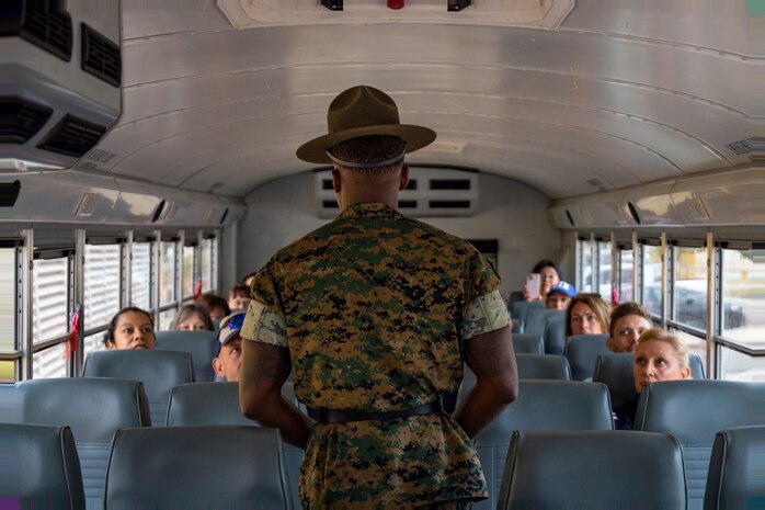 U.S. Marine Corps Staff Sgt. Devon Greene, a drill instructor with Alpha Company, 1st Recruit Training Battalion, prepares educators with Recruiting Station Oklahoma City for a mock receiving event as a part of the 2024 Educators' Workshop at Marine Corps Recruit Depot San Diego, Calif., June 18, 2024. Participants visited MCRD San Diego to observe recruit training and gain a better understanding about the transformation from recruits to United States Marines. Educators also received classes and briefs on the benefits that are provided to service members serving in the U.S. Armed Forces. (U.S. Marine Corps photo by Sgt. Lennon Dregoiw)