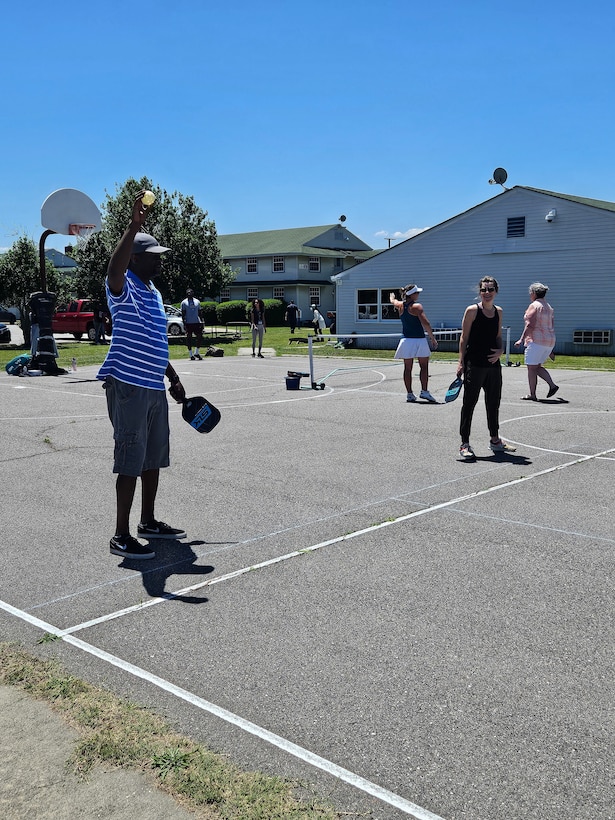 People playing pickleball