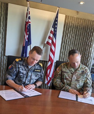Commodore Shane Glassock, the director general for Logistics Operations Branch at the Joint Logistics Command and Maj. Gen. Jered Helwig, the commanding general of the 8th Theater Sustainment Command, signed a logistics letter of intent to establish the care of supplies in storage for U.S. Army equipment in Bandiana, Australia May 21, 2024.