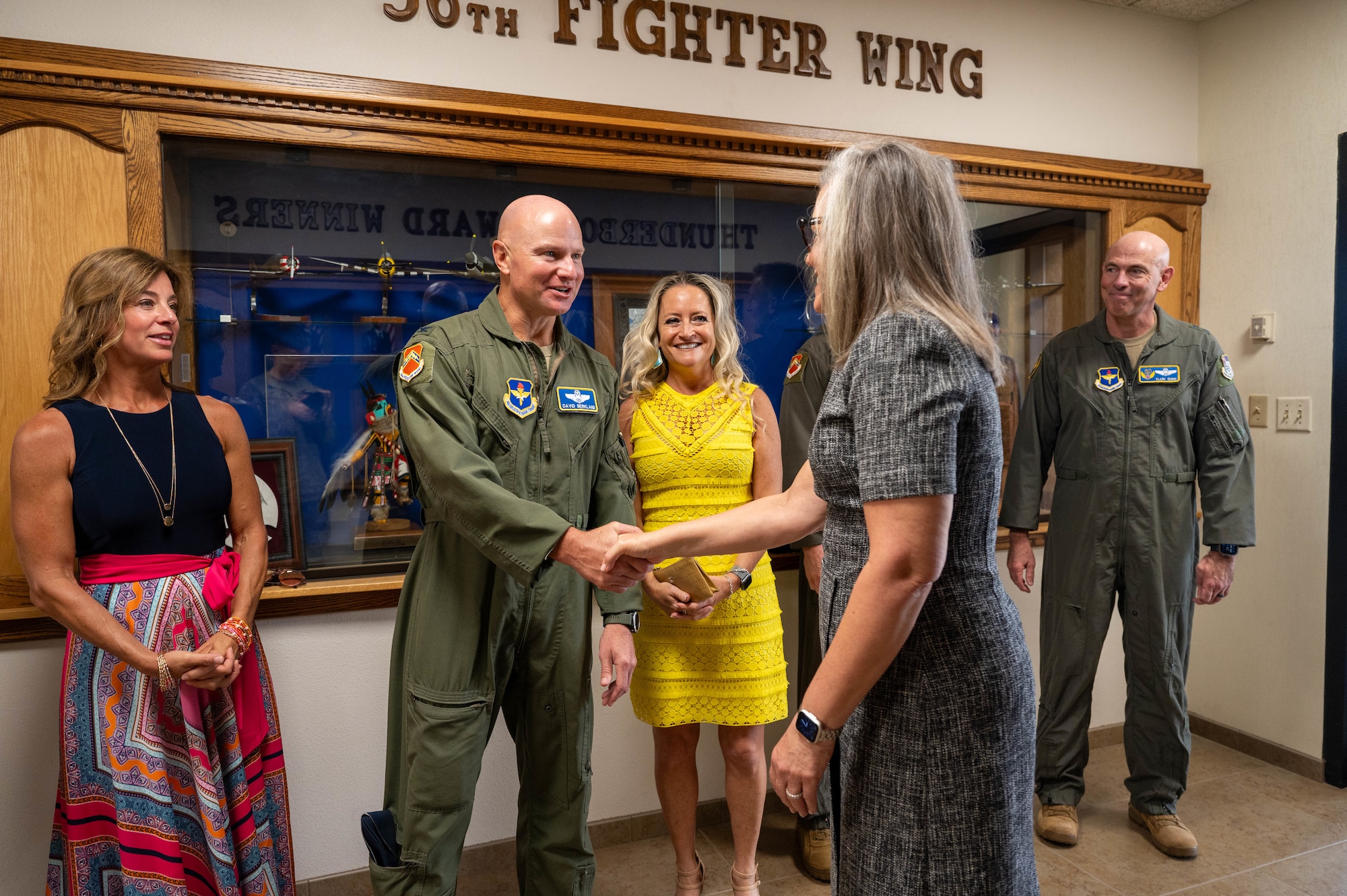 U.S. Air Force Col. David Berkland, 56th Fighter Wing incoming commander, greets Arizona Governor Katie Hobbs before the 56th FW Change of Command ceremony, July 1, 2024, at Luke Air Force Base, Arizona.