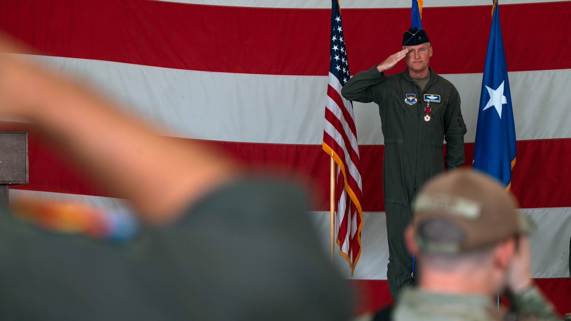 U.S. Air Force Brig. Gen. Jason Rueschhoff, 56th Fighter Wing outgoing commander, gives the final salute at the 56th Fighter Wing Change of Command ceremony, July 1, 2024, at Luke Air Force Base, Arizona.