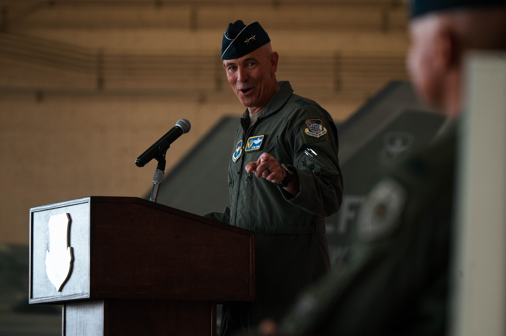 U.S. Air Force Maj. Gen. Clark J. Quinn, 19th Air Force commander, speaks at the 56th Fighter Wing Change of Command ceremony, July 1, 2024, at Luke Air Force Base, Arizona.