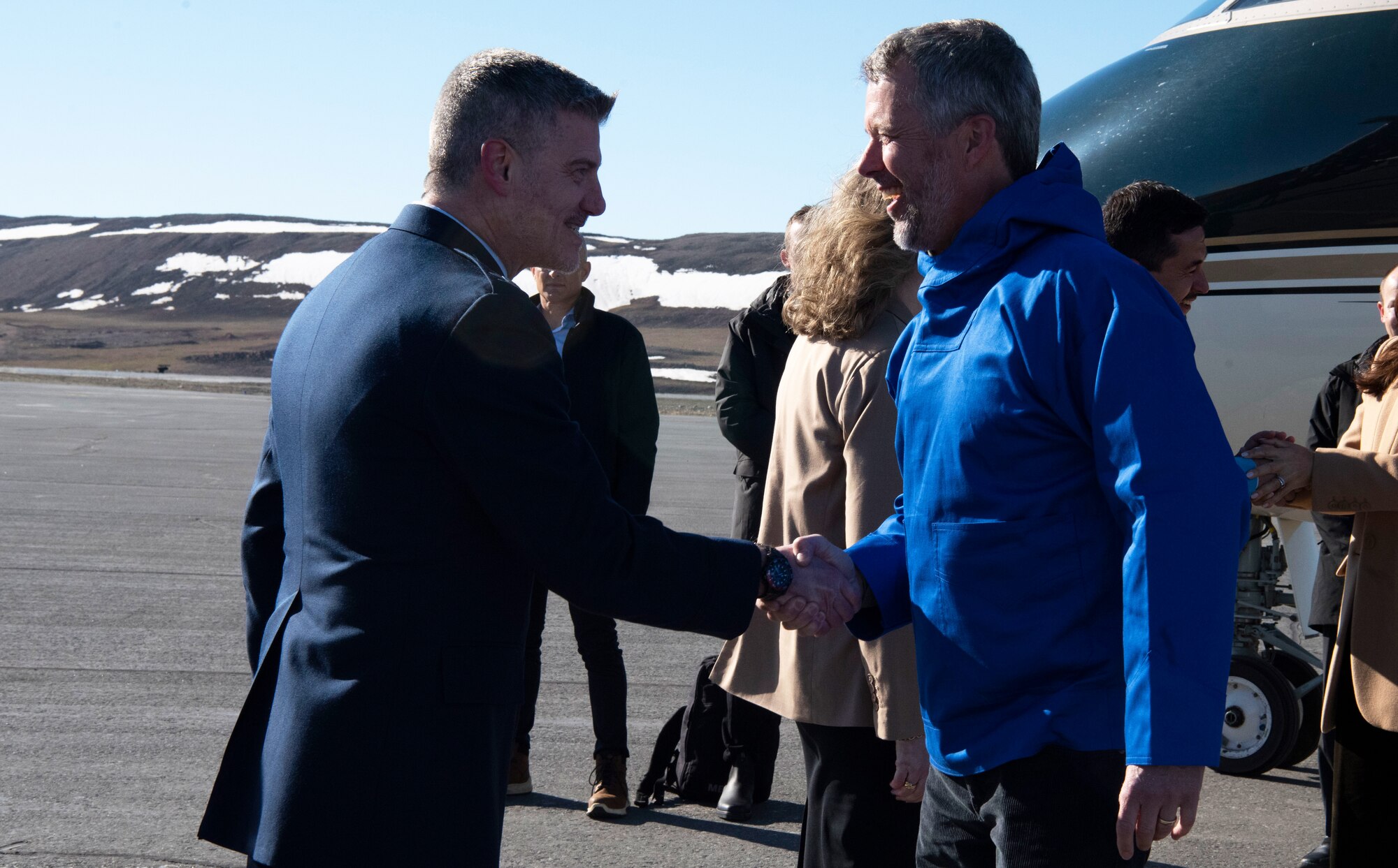 U.S. Space Force Col. Jason Terry, 821st Space Base Group commander, left, shakes the hand of King Frederik X, King of the Kingdom of Denmark, right, after his arrival to Pituffik Space Base, Greenland, June 29, 2024. King Frederik X acceded to the throne of the Kingdom of Denmark January 14, 2024. (U.S. Space Force photo by 1st Lt. Danielle Rose)