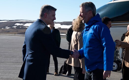  U.S. Space Force Col. Jason Terry, 821st Space Base Group commander, left, shakes the hand of King Frederik X, King of the Kingdom of Denmark, right, after his arrival to Pituffik Space Base, Greenland, June 29, 2024. King Frederik X acceded to the throne of the Kingdom of Denmark January 14, 2024. (U.S. Space Force photo by 1st Lt. Danielle Rose)