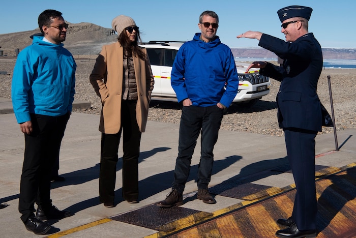 From the left, Múte Bourup Egede, Prime Minister of Greenland, Queen Mary, Queen of the Kingdom of Denmark, King Frederik X, King of the Kingdom of Denmark, and U.S. Space Force Col. Jason Terry, 821st Space Base Group commander, have a discussion together while standing on top of the iconic site D-Launch, located on the outskirts of Pituffik Space Base, Greenland, June 29, 2024. In pursuit of nuclear deterrence, D-launch served as an underground ice filled missile silo for the U.S. during the Cold War. (U.S. Space Force photo by 1st Lt. Danielle Rose)