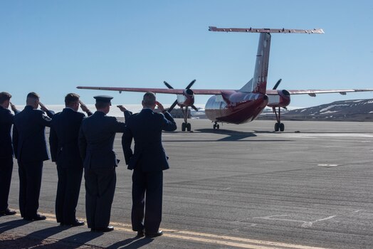  The 821st Space Base Group command team render salutes at a Greenlandic aircraft as King Frederick X, King of the Kingdom of Denmark departs from Pituffik Space Base, Greenland, June 29, 2024. King Frederik X and wife Queen Mary made a stop to Pituffik SB while on their way to the village of Qaanaaq. (U.S. Space Force photo by 1st Lt. Danielle Rose)