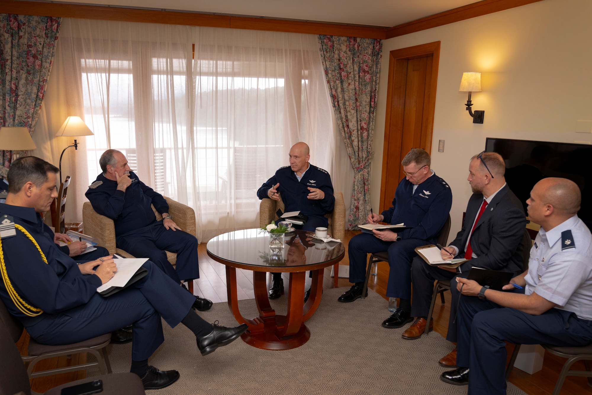 U.S. Air Force Chief of Staff Gen. David Allvin, center, speaks with Argentinian Air Force Chief of Staff Gen. Fernando Luis Mengo, center left, during the 64th Conference of the American Air Chiefs meeting in San Carlos de Bariloche, Argentina, June 19, 2024. These one-on-one Key Leader Engagements assist in establishing and successfully executing shared security objectives while generating mutual trust and understanding. (U.S. Air Force photo by Tech. Sgt. Rachel Maxwell)