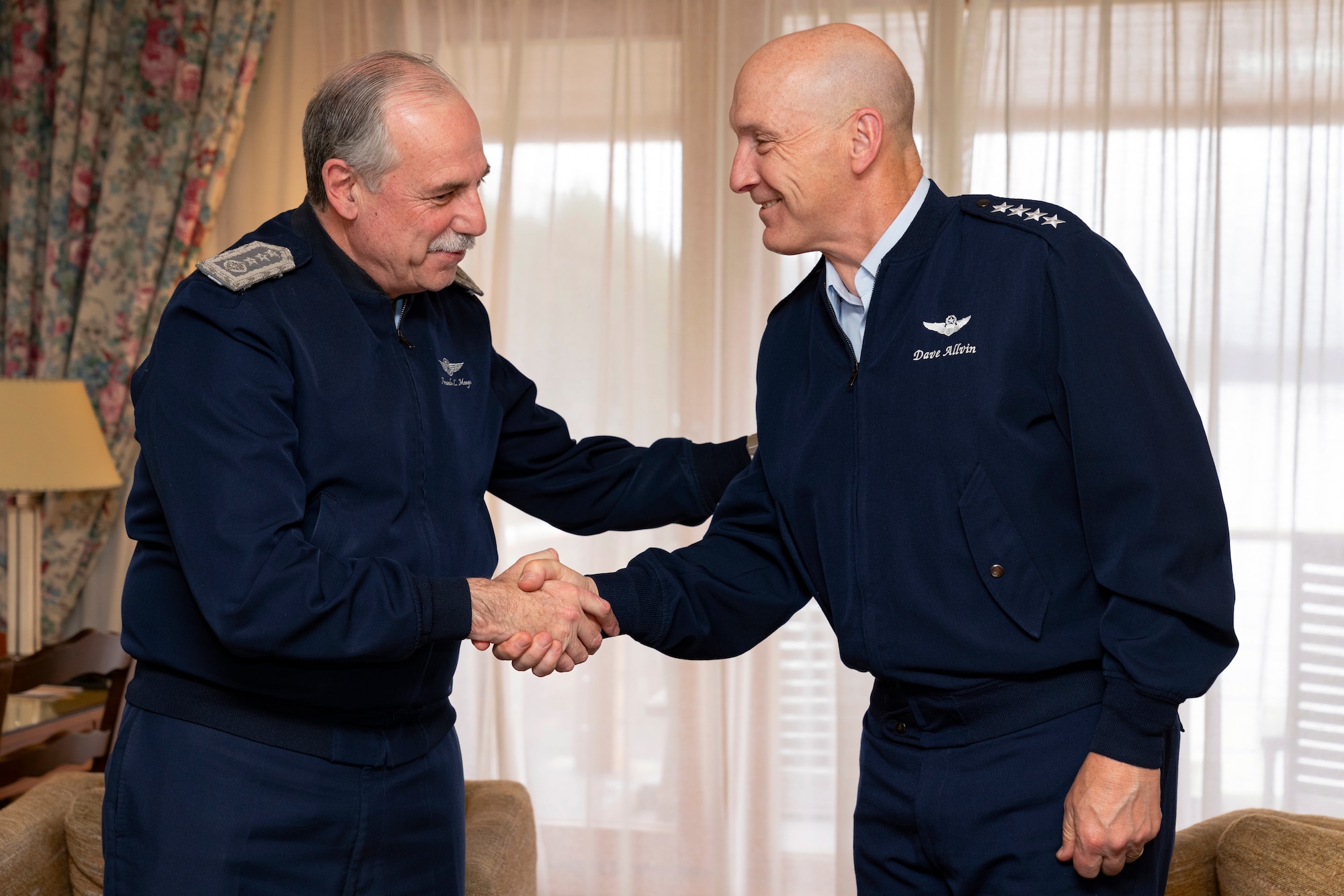 U.S. Air Force Chief of Staff Gen. David Allvin, right, shakes hands with Argentinian Air Force Chief of Staff Gen. Fernando Luis Mengo, left, during the 64th Conference of the American Air Chiefs meeting in San Carlos de Bariloche, Argentina, June 19, 2024. Senior air force leaders and representatives spanning 19 nations took part in discussions concentrated on the collective readiness needs of the Western Hemisphere in order to meet shared visions and lay plans for future exercises. (U.S. Air Force photo by Tech. Sgt. Rachel Maxwell)