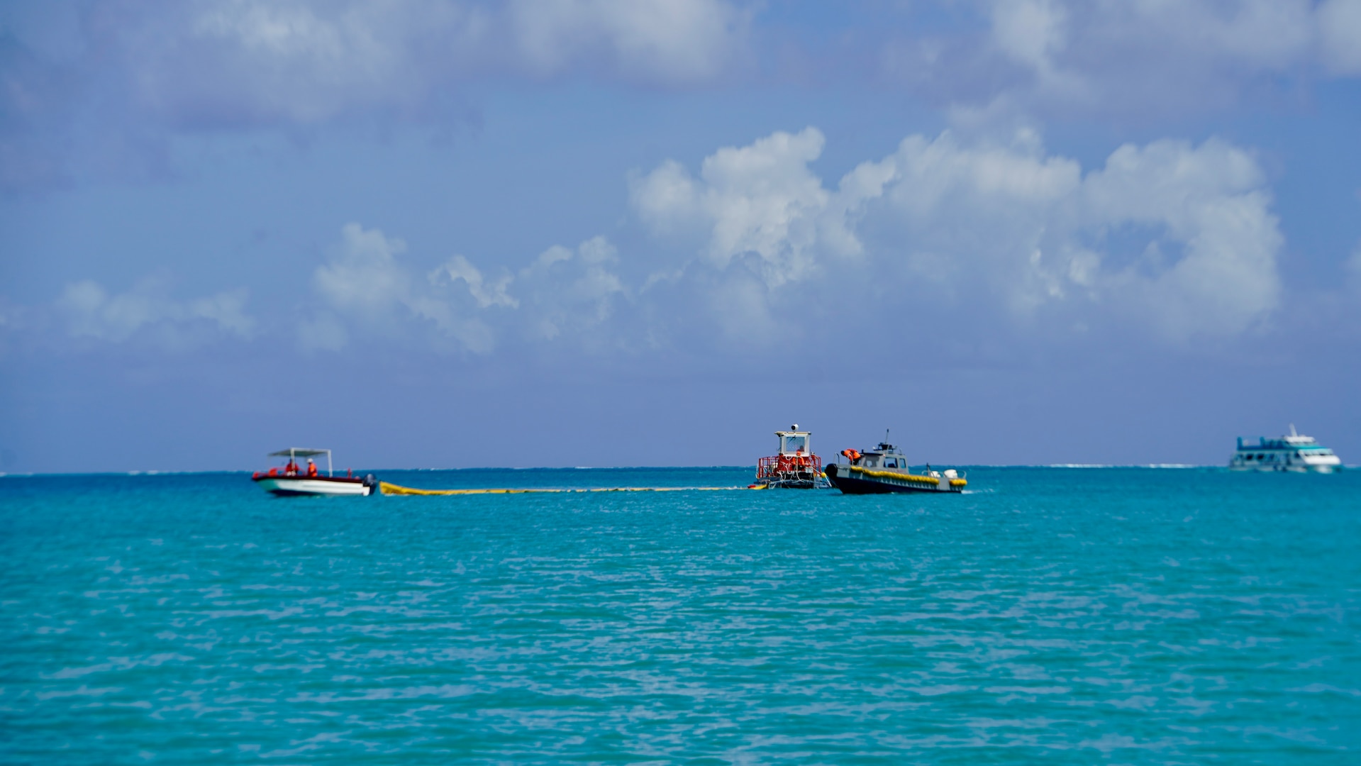 GARAPAN, Saipan, CNMI — U.S. Coast Guard Forces Micronesia/Sector Guam, in partnership with the CNMI Office of Homeland Security and Emergency Management (HSEM), the Commonwealth Port Authority, and Isla Petroleum & Energy (IP&E), successfully concluded the first-ever full-scale exercise, dubbed Lina'la Halom Tasi 2024, from June 25 to 27. This exercise simulated an oil spill and aimed to enhance response capabilities and coordination among various regional agencies and organizations.

Cmdr. Ryan Crose, deputy commander of U.S. Coast Guard Forces Micronesia/Sector Guam, praised the collaborative efforts, stating, "The Lina'la Halom Tasi Exercise 2024 is the first-ever full-scale pollution response exercise in the CNMI. It showcases the strength of our partnership with the CNMI. Our joint efforts in everything from the regional response plan to testing it in this exercise significantly improved our ability to respond effectively to maritime emergencies, ensuring the safety and security of our waters. We look forward to continued collaboration with our CNMI partners to enhance our collective preparedness and resilience."