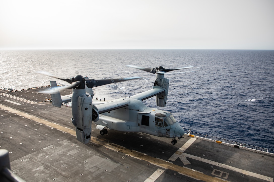 A U.S. Marine Corps MV-22B Osprey tiltrotor aircraft with Marine Medium Tiltrotor Squadron 365 (Reinforced), 24th Marine Expeditionary Unit (MEU) Special Operations Capable (SOC), lands on the amphibious assault ship USS Wasp (LHD 1) during routine flight operations while underway in the Mediterranean Sea, June 28, 2024. The Wasp Amphibious Ready Group-24th MEU (SOC) is conducting operations in U.S. Naval Forces Europe area of operations to support high-end warfighting exercises while demonstrating speed and agility operating in a dynamic security environment. (U.S. Marine Corps photo by Gunnery Sgt. Hector de Jesus)