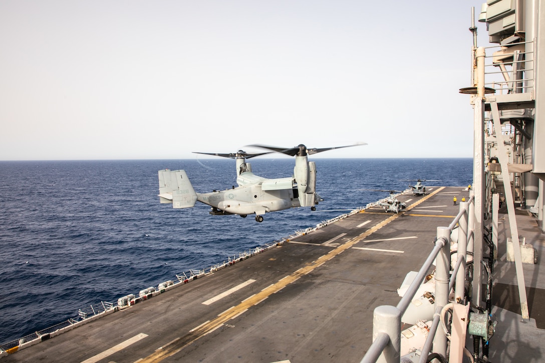 A U.S. Marine Corps MV-22B Osprey tiltrotor aircraft with Marine Medium Tiltrotor Squadron 365 (Reinforced), 24th Marine Expeditionary Unit (MEU) Special Operations Capable (SOC), lands on the amphibious assault ship USS Wasp (LHD 1) during routine flight operations while underway in the Mediterranean Sea, June 28, 2024. The Wasp Amphibious Ready Group-24th MEU (SOC) is conducting operations in U.S. Naval Forces Europe area of operations to support high-end warfighting exercises while demonstrating speed and agility operating in a dynamic security environment. (U.S. Marine Corps photo by Gunnery Sgt. Hector de Jesus)