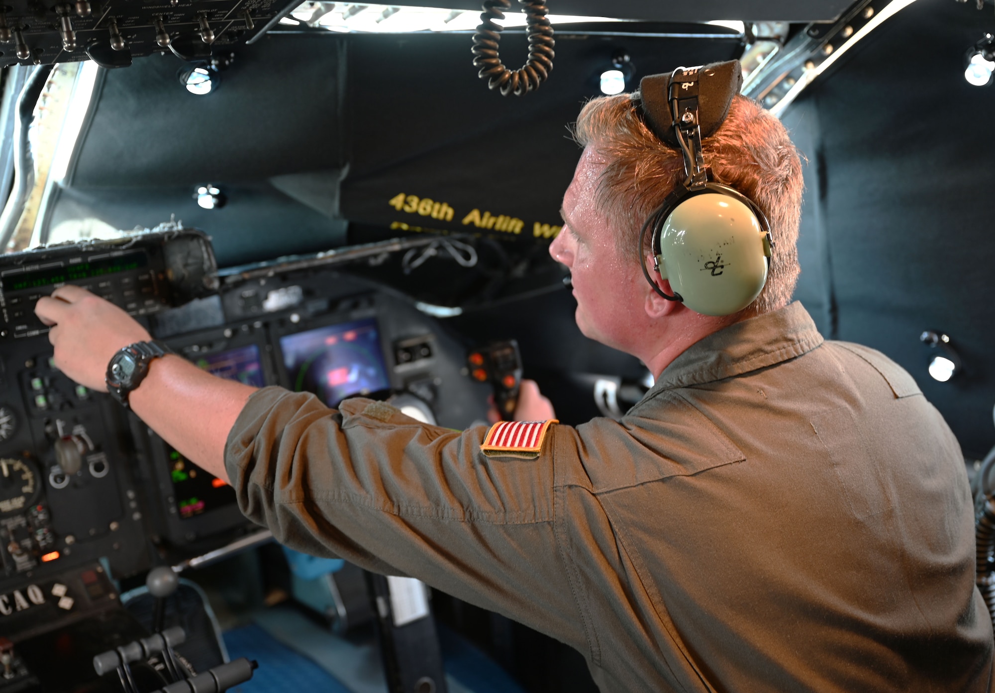 Engineer performs check in flight deck
