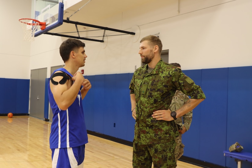 The Kentucky Wildcats hosted Lieutenant Andreas Martson, an Estonian Signal Officer training with the 2/138th through the Military Reserve Exchange Program (MREP) on June 20th, 2024. Martson and members of the 2/138th observed the Wildcats practice and met the team during Martson's cultural day. (U.S. Army National Guard Photo by Capt. Kaitlin Baudendistel)