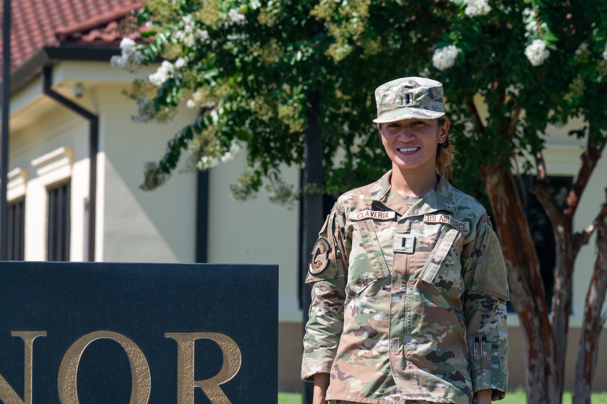 U.S. Air Force 1st Lt. Aileen Claveria, an officer trainee assigned to Air Force Officer Training School, stands at Welch Field for a feature photograph at Maxwell Air Force Base, Alabama, July 1, 2024. Claveria aspired to join the U.S. Air Force at a young age and finally commissioned as a public health officer in July, 2023. (U.S. Air Force photo by Senior Airman Evan Porter)