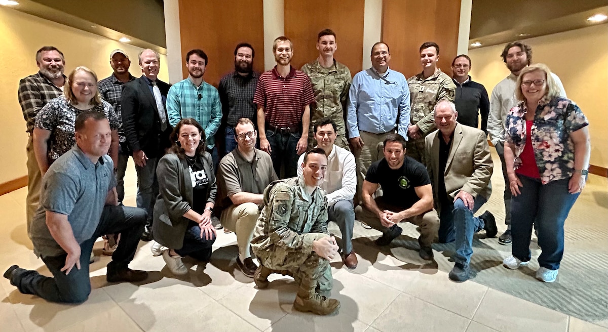 2024 Air Force Research Laboratory, or AFRL, Commander’s Challenge competitors gather for a group photo with their program manager, team mentors and other supporting staff at a kickoff event held at the Wright Brothers Institute in Dayton, Ohio, May 17, 2024. Nineteen  individuals representing eight of AFRL’s technical and functional directorates, the 711th Human Performance Wing and the Air Force Life Cycle Management Center have been selected to serve on one of two teams in response to AFRL Commander Maj. Gen. Scott A. Cain’s March 2024 call for contenders in this year’s competition to develop low-cost solutions to counter and defeat slow-moving, high-altitude balloons. (U.S. Air Force photo / Gail L. Forbes)