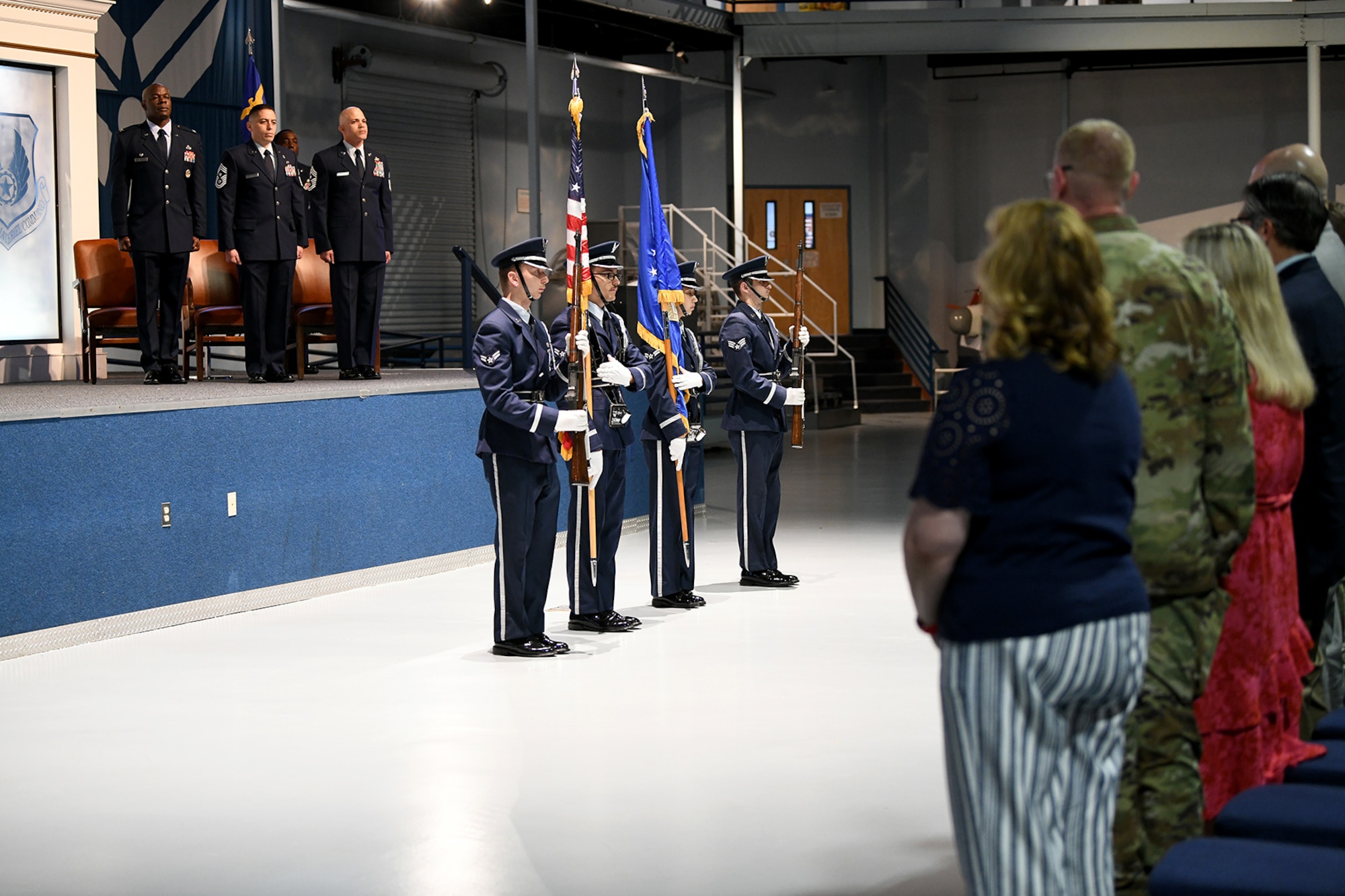 People in military uniform standing up