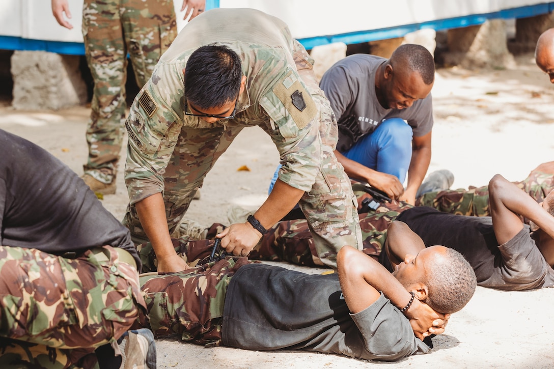 U.S. military personnel, led by Task Force Paxton medic Cpl. Vince Bartolome, recently spent three days teaching Kenyan military forces Tactical Combat Casualty Care while stationed in Manda Bay, Kenya. (U.S. Army National Guard photo by Staff Sgt. Jonathan Campbell)