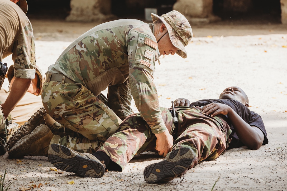 U.S. military personnel, led by Task Force Paxton medic Cpl. Vince Bartolome, recently spent three days teaching Kenyan military forces Tactical Combat Casualty Care while stationed in Manda Bay, Kenya. (U.S. Army National Guard photo by Staff Sgt. Jonathan Campbell)