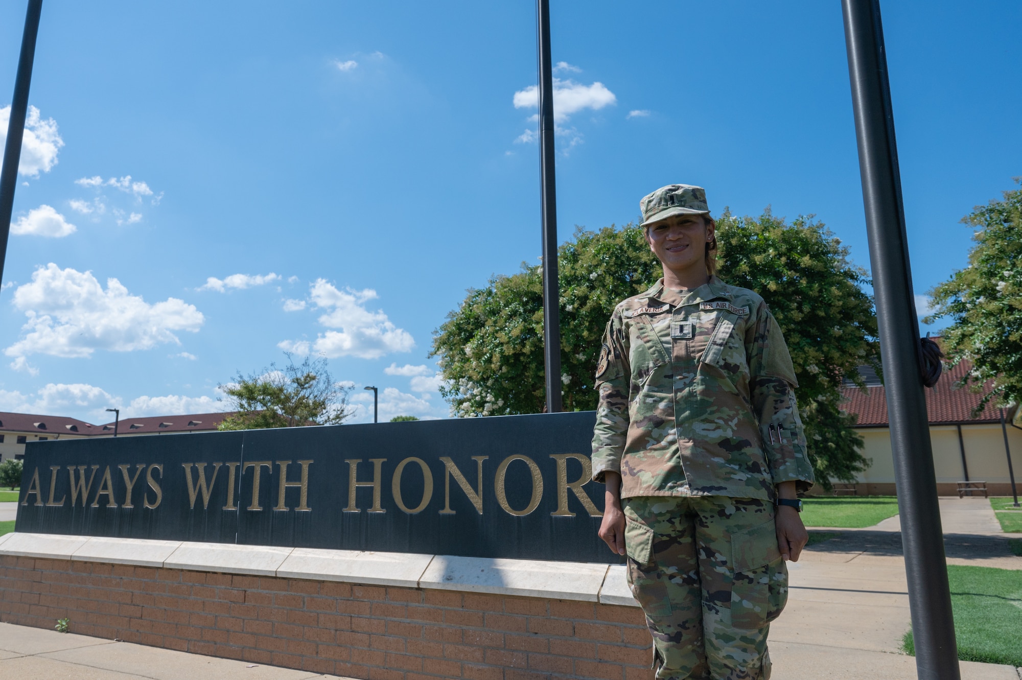 U.S. Air Force 1st Lt. Aileen Claveria, an officer trainee assigned to Air Force Officer Training School, stands at Welch Field for a feature photograph at Maxwell Air Force Base, Alabama, July 1, 2024. Claveria aspired to join the airforce at a young age and finally commisioned as a public health officer in July, 2023. (U.S. Air Force photo by Senior Airman Evan Porter)