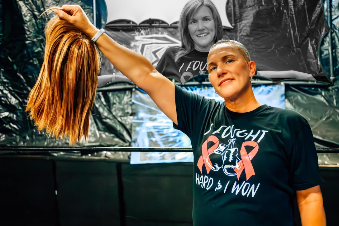 Woman holding a wig
