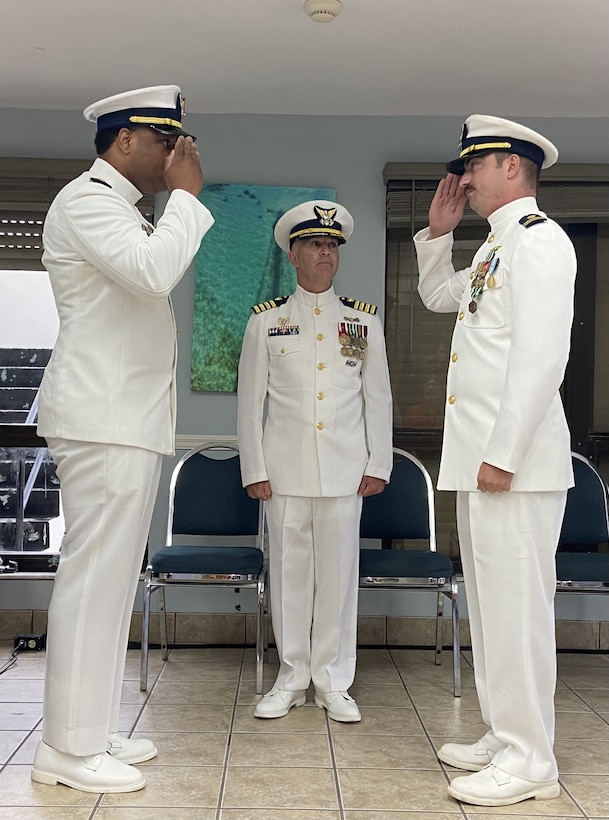 Lt. Shamir Tyner relieves Lt. Samuel Krakower as commanding officer of CGC Raymond Evans (WPC-1110), July 1, 2024, during a change-of-command ceremony at Coast Guard Sector Key West, Florida.