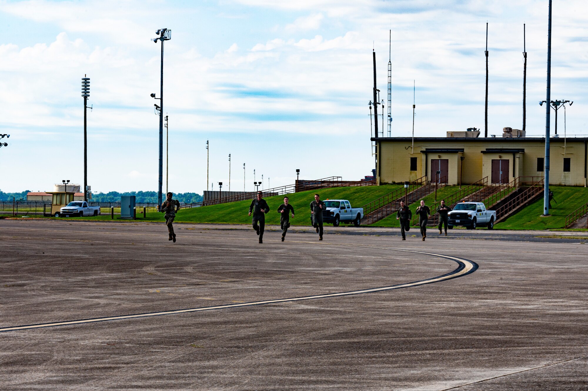 Airmen from the 96th Bomb Squadron rush to their aircraft as part of exercise Red Devil Thunder at Barksdale Air Force Base, La., June 27, 2024. RDT was an exercise conducted to prepare aircrew in nuclear readiness, with a focus on nuclear weapons familiarization training and aircrew response time. (U.S. Air Force photo by Airman 1st Class Aaron Hill)