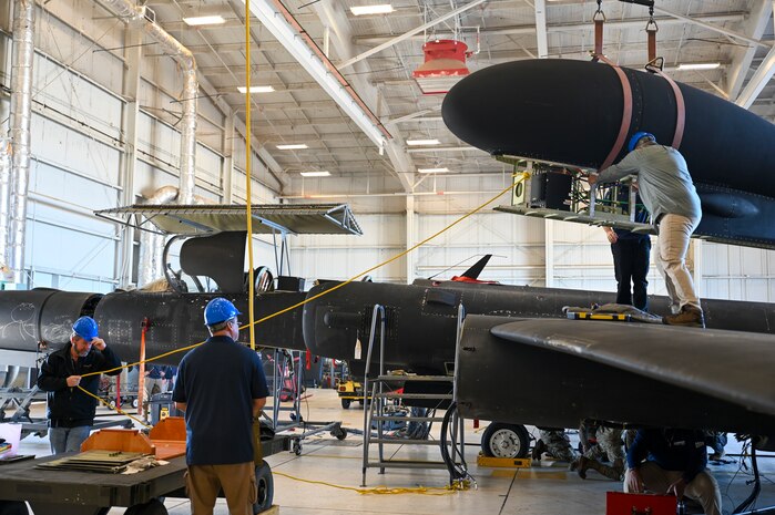 9th Maintenance Squadron data link maintainers move the Pylon Equipment Group (PEG) to a trailer on Beale Air Force Base, California, April 8, 2024.