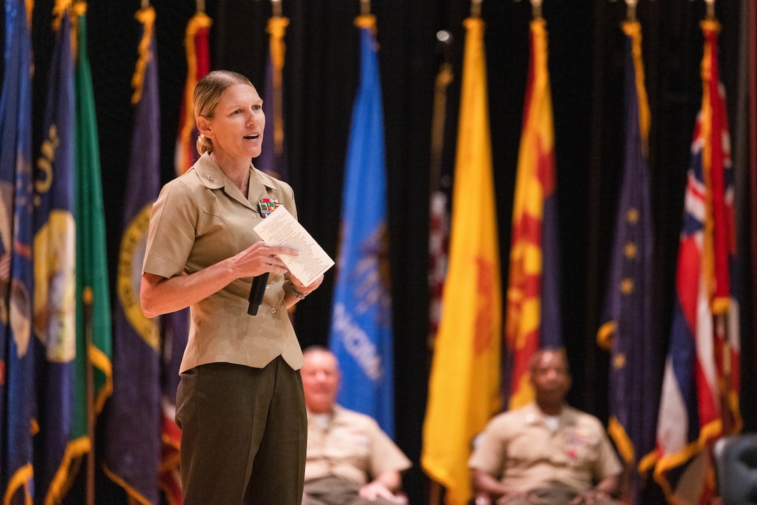 U.S. Marine Corps Col. Jenny Colegate, the new commanding officer of Marine Corps Base Quantico, addresses the audience during a change of command ceremony on MCBQ Virginia, July 2, 2024. Col. Michael L. Brooks, the outgoing commanding officer of MCBQ, relinquished command to Colegate after serving as the commander for almost three years. “I refer to Marine Corps Base Quantico as a village, and I do that on purpose,” Brooks said. “It’s not all about the capabilities, but those [people in Quantico] who involve themselves; they insert themselves in to what needs to be done in support of the village.” (U.S. Marine Corps photo by Cpl. Darien Wright)