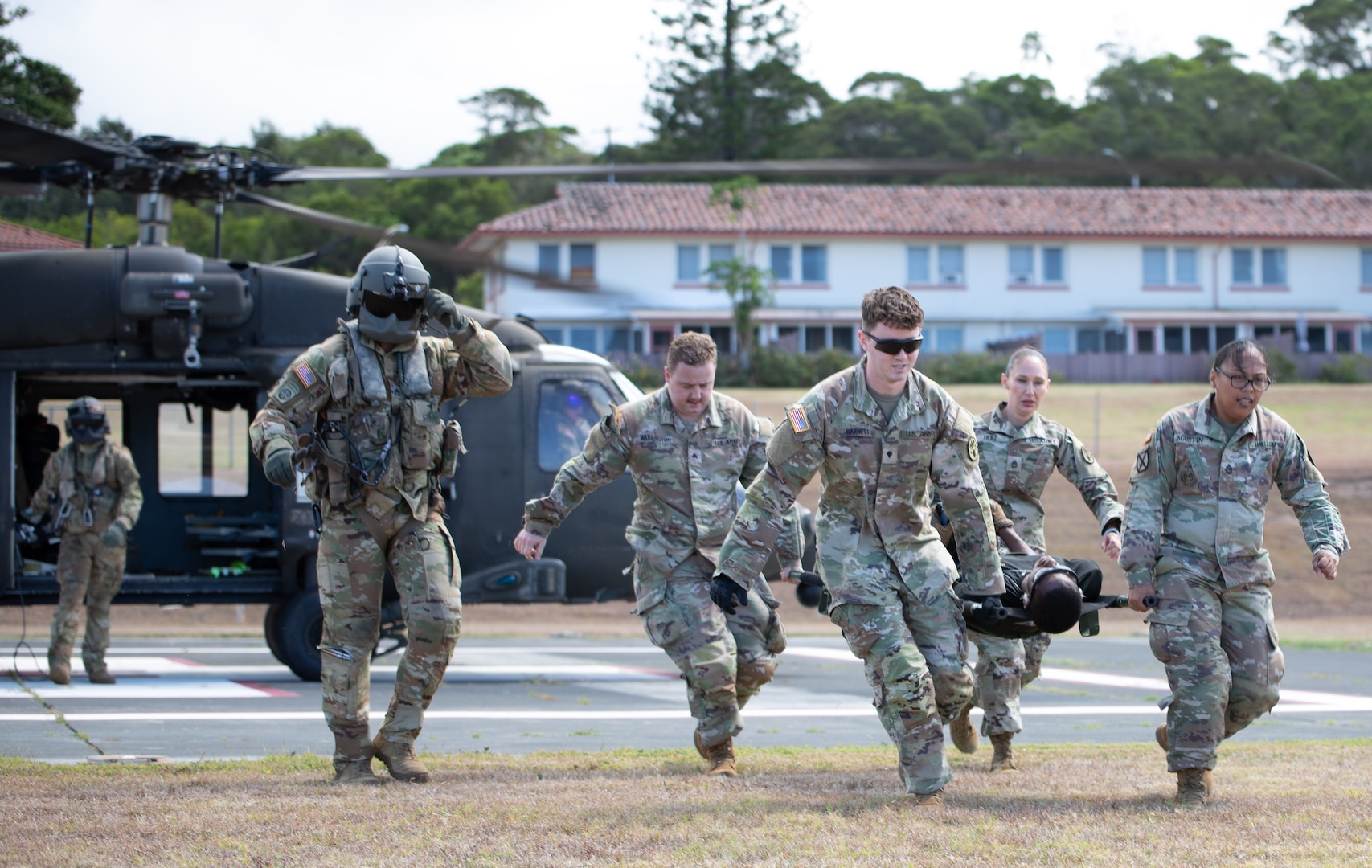 U.S. Army Soldiers assigned to Tripler Army Medical Center simulate transporting patients to the TAMC Emergency Department as part of a mass casualty exercise on Aug. 10, 2023