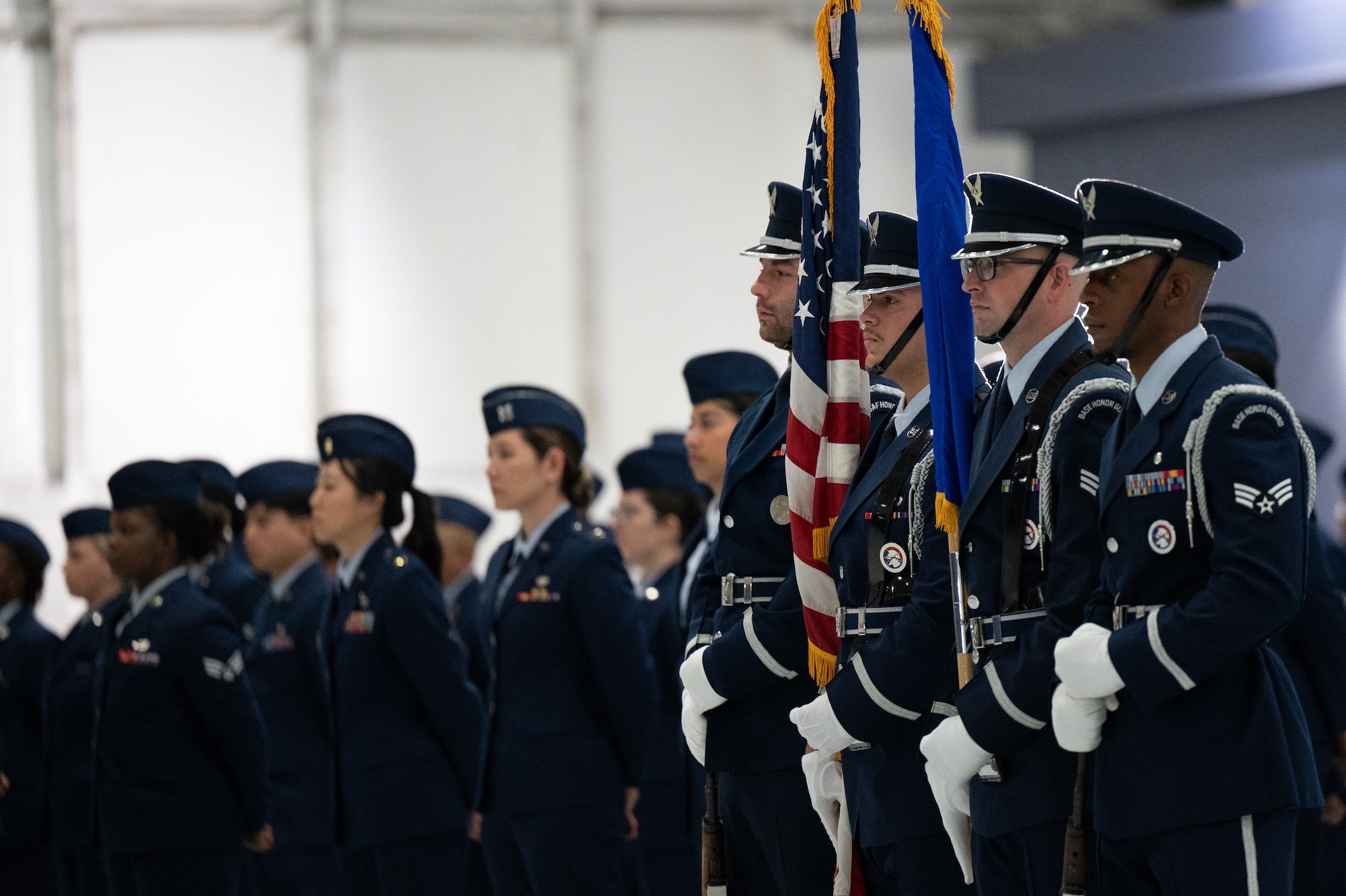 U.S. Air Force Honor Guard and 316th Wing Airmen stand in formation