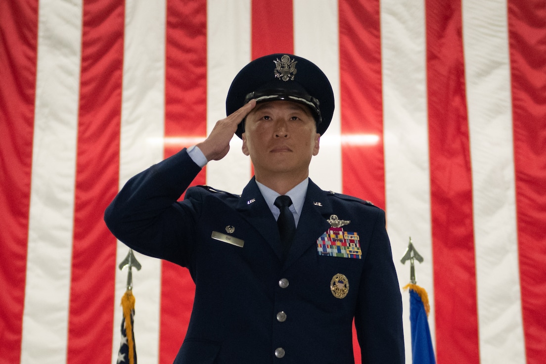 U.S. Air Force Col. Jun S. Oh, renders his first salute as the new 316th Wing and installation commander
