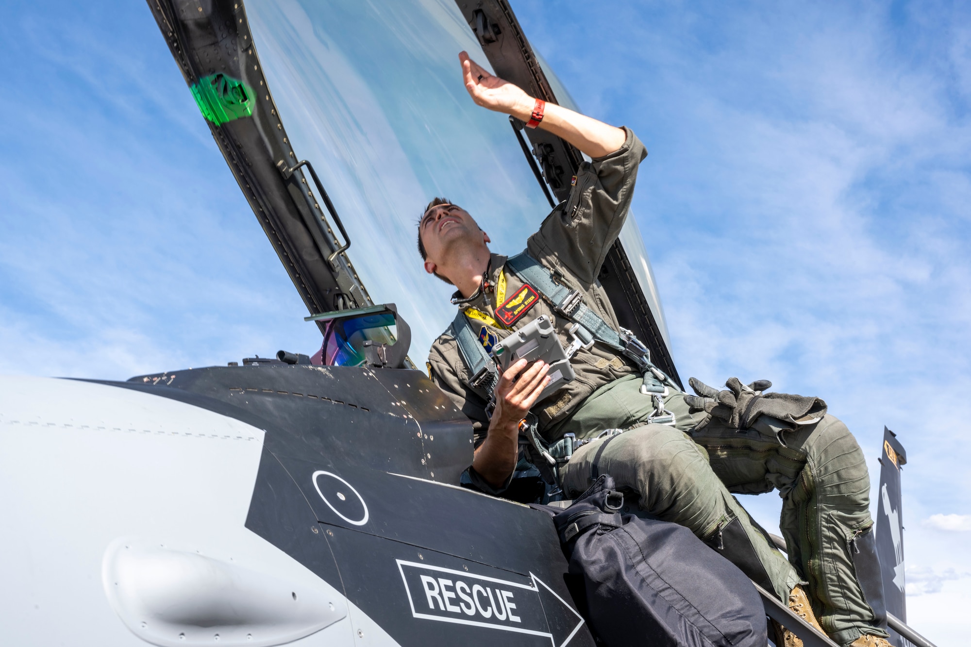 U.S. Air Force Maj. Colton Steen, 8th Fighter Squadron chief of weapons, performs a pre-flight inspection at Holloman Air Force Base, June 25, 2024. The 8th FS unveiled its new flagship, which is painted with a matte black color scheme that draws inspiration from the legendary F-117 Nighthawk stealth aircraft. (U.S. Air Force photo by Airman 1st Class Michelle Ferrari)