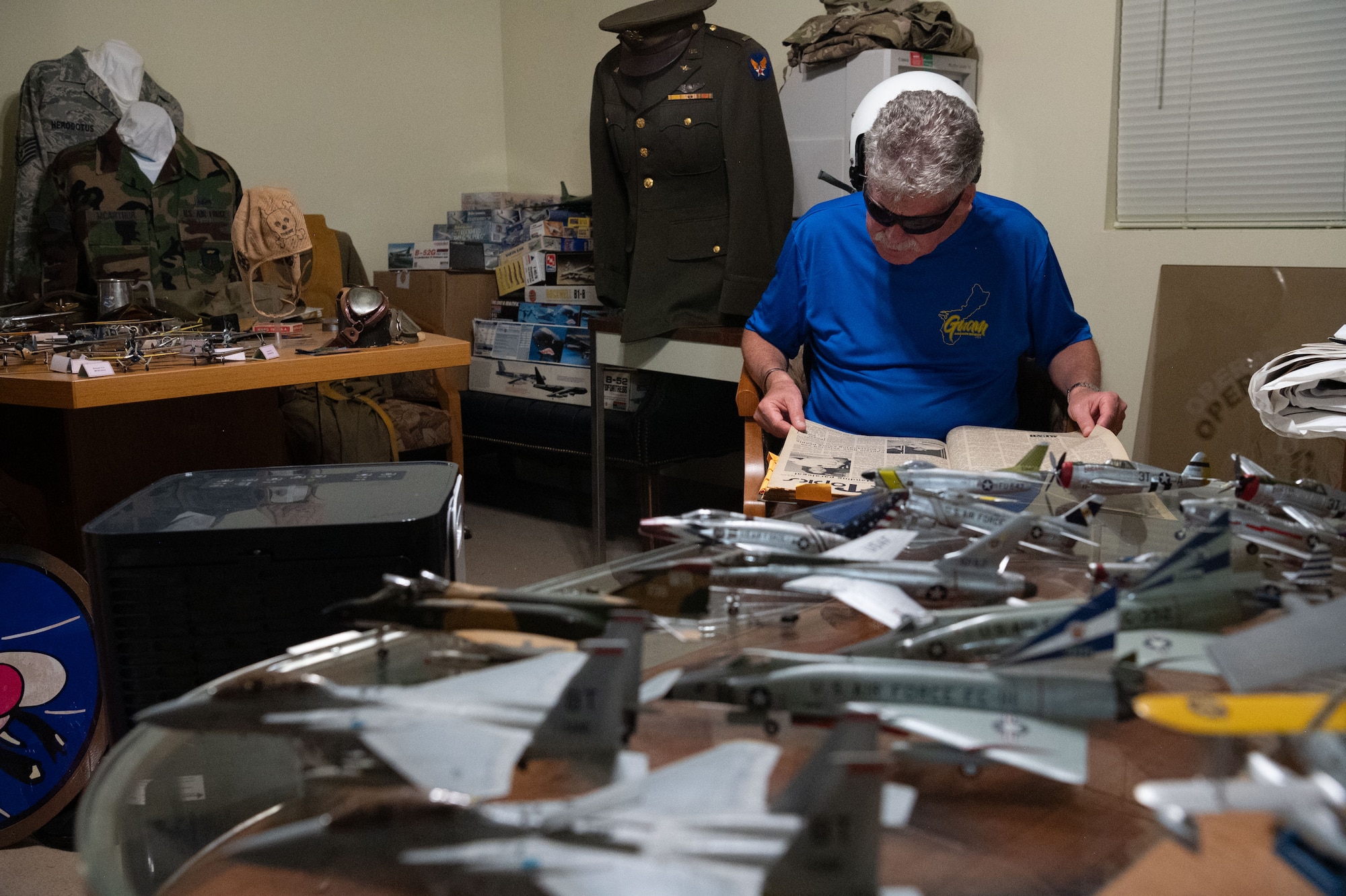 U.S. Air Force veterans return to Andersen Air Force base to look back at documents from the past. Brad Bone, Doug Marek, and Ralph Hawkins, who were stationed at Andersen Air Force Base, in the late 1970s, meet with Andersen AFB Historian Jeff Meyer.