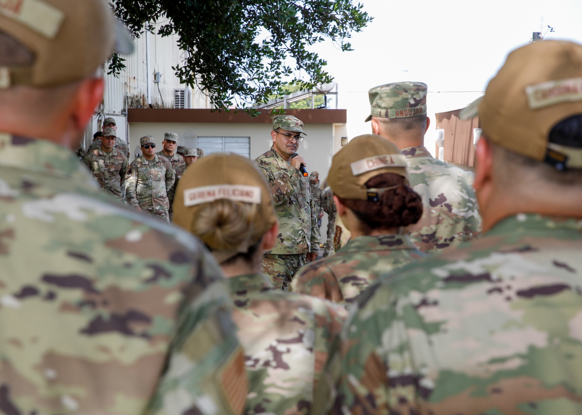 U.S. Air Force Brig. Gen. Humberto Pabon Jr., the assistant adjutant general-air, Puerto Rico Air National Guard, addresses the Airmen of the 141st Air Control Squadron and explains their change of mission in becoming an Air Mobility Squadron at Punta Borinquen Radar Site, Aguadilla, Puerto Rico, June 1, 2024. The transition from an ACS to an AMS will be effective April 1, 2025, upon completion of their upcoming deployment. (U.S. Air National Guard photo by Tech. Sgt. Josue Rivera)