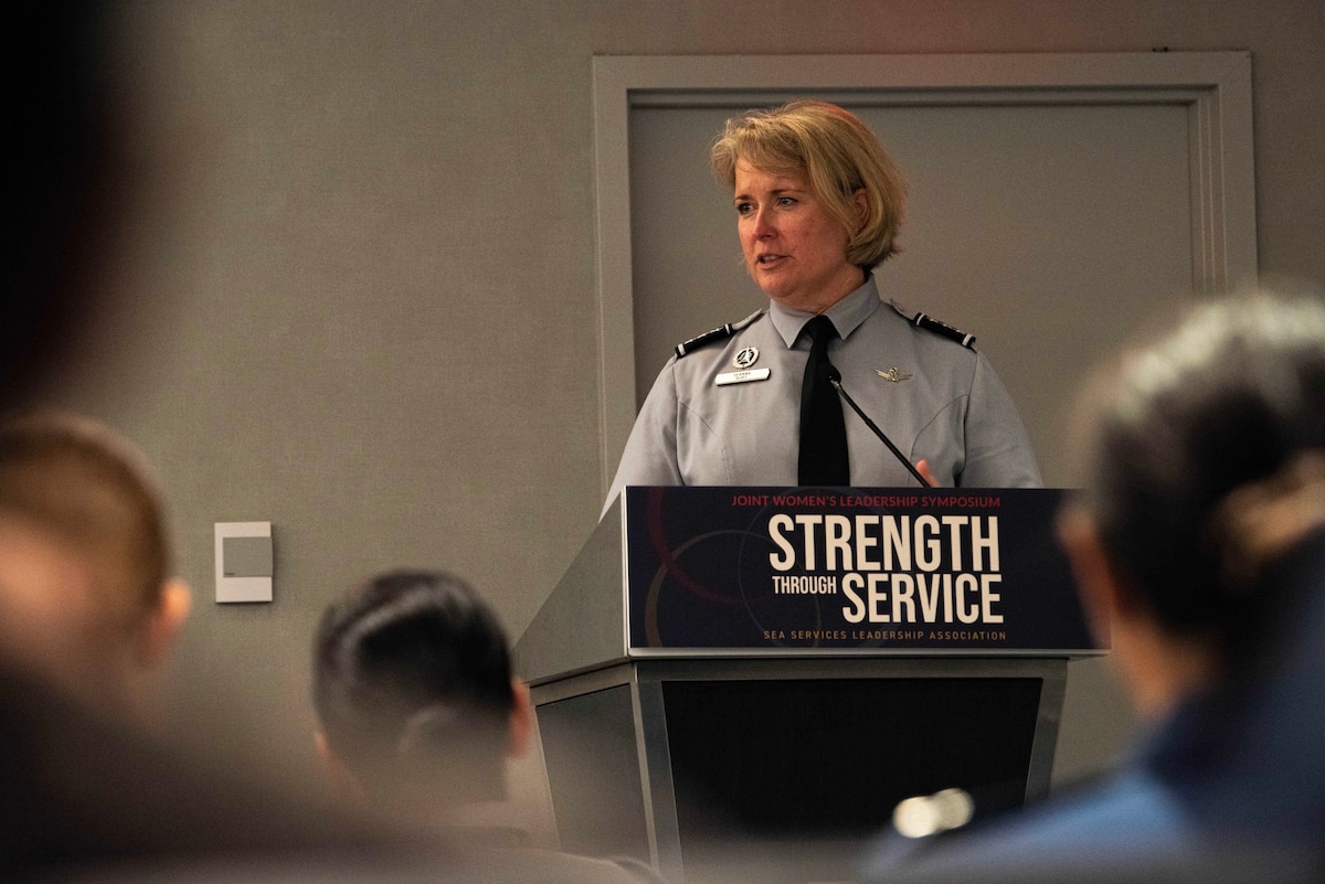 U.S. Space Force Lt. Gen. DeAnna Burt, deputy chief of Space Operations for Operations, Cyber and Nuclear, delivers remarks at the Joint Women's Leadership Symposium in Arlington, Va., June 27, 2024. Burt highlighted women's contributions to military history, detailing their involvement from the American Revolutionary War to the present. She described the evolution of women's roles in the military, noting significant milestones including the Women's Armed Services Integration Act of 1948 and the repeal of the combat exclusion policy in 2013. (U.S. Air Force photo by Staff Sgt. Emmeline James)