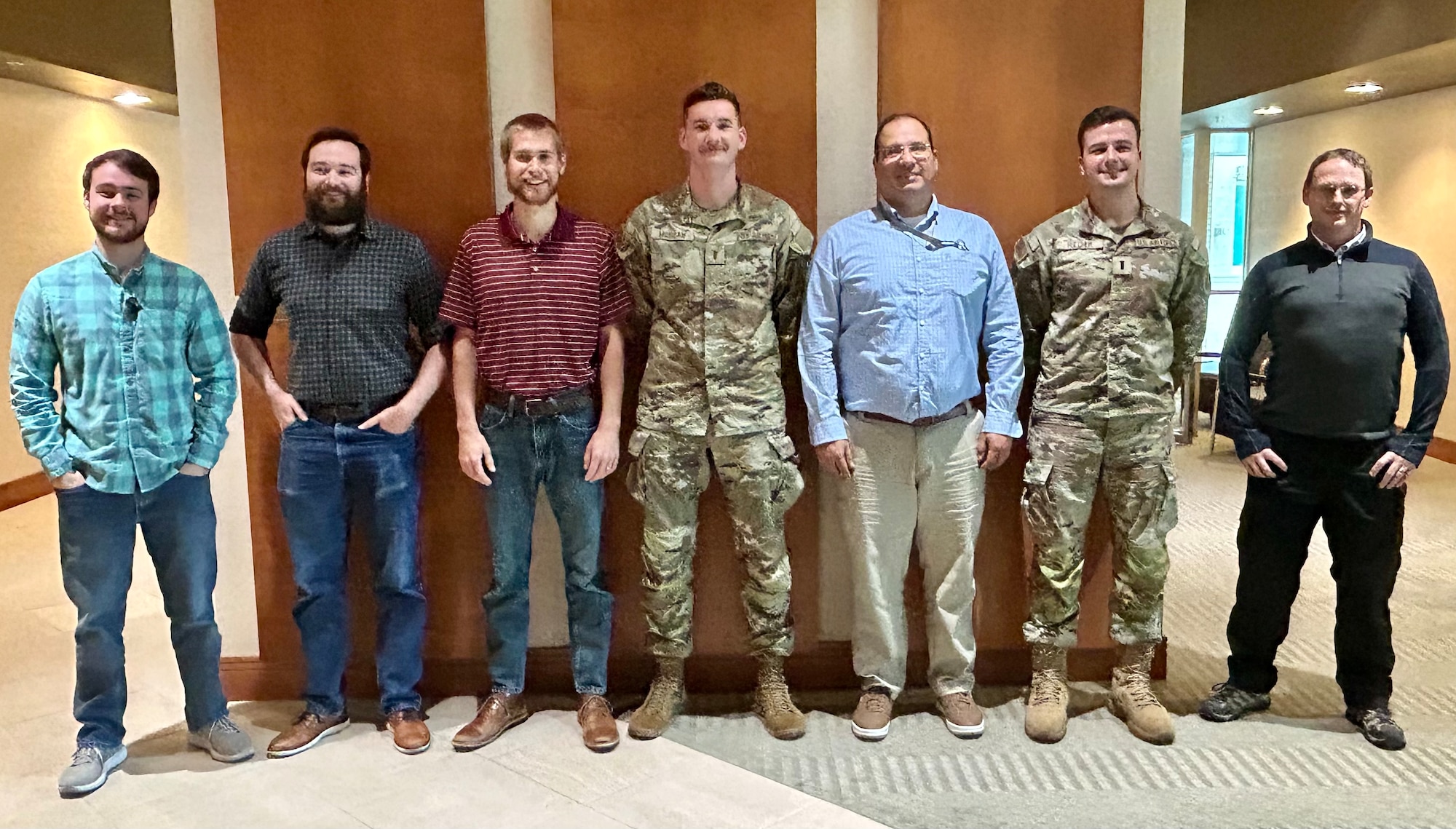 A group of 2024 Air Force Research Laboratory, or AFRL, Commander’s Challenge competitors from Eglin Air Force Base, Fla., and Kirtland Air Force Base, N.M., gather for a team photo at a kickoff event held at the Wright Brothers Institute in Dayton, Ohio, May 17, 2024. The seven competitors and their three mentors, representing AFRL’s Directed Energy and Munitions directorates, answered AFRL Commander Maj. Gen. Scott A. Cain’s March 2024 call for contenders in this year’s competition. With just six months and a $75,000 budget, the Eglin-Kirtland team will develop and deliver low-cost solutions to counter slow-moving, high-altitude aerial targets. They will face off with a Wright-Patterson Air Force Base-based team in a final competition in December, where they will demonstrate and test their proposed solutions before a panel of judges. (U.S. Air Force photo / Gail L. Forbes)