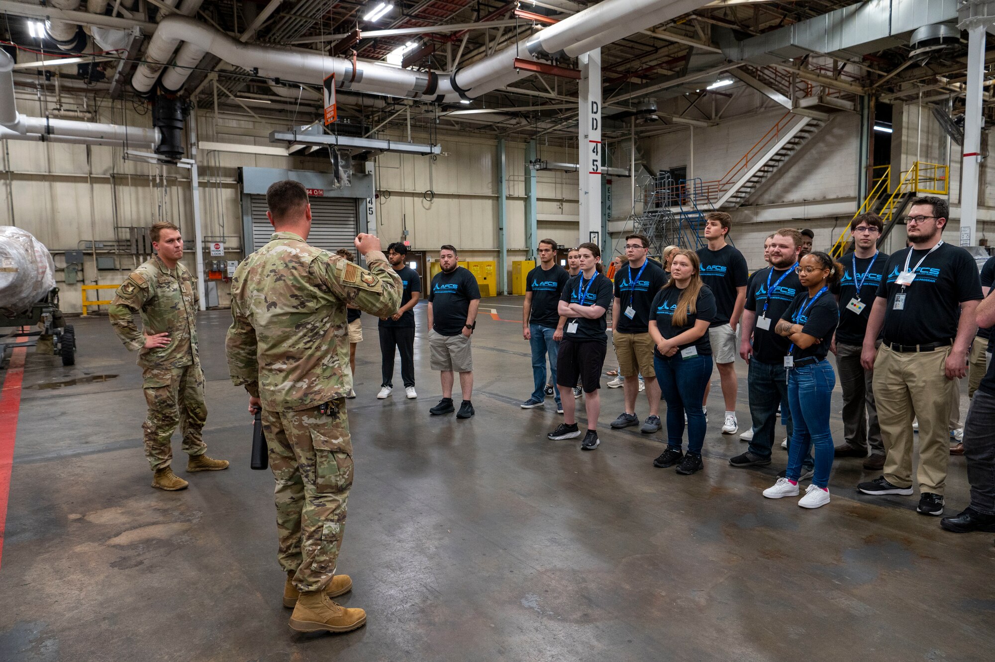 Airmen from the Oklahoma City Air Logistics Complex share the mission of the OC-ALC to Premiere College Intern Program members, June 26, 2024, at Tinker Air Force Base, Oklahoma.