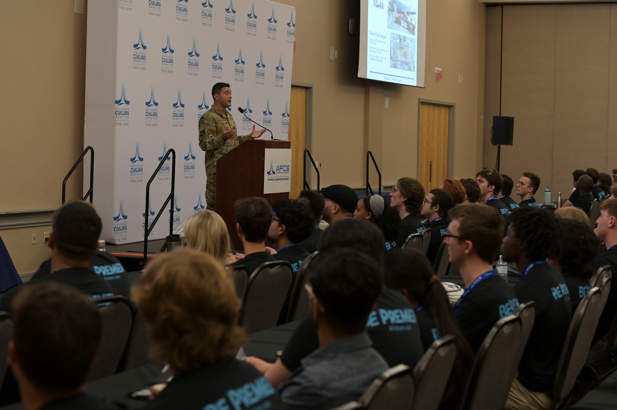 Col. John Upthegrove, 72nd Air Base Wing individual mobilization augmentee to the commander, educates Premiere College Intern Program members June 26, 2024, about Tinker Air Force Base, Oklahoma.