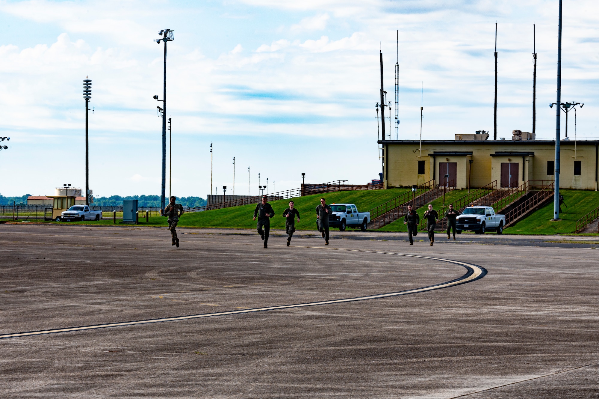 Airmen from the 96th Bomb Squadron rush to their aircraft as part of exercise Red Devil Thunder at Barksdale Air Force Base, La., June 27, 2024. RDT was an exercise conducted to prepare aircrew in nuclear readiness, with a focus on nuclear weapons familiarization training and aircrew response time. (U.S. Air Force photo by Airman 1st Class Aaron Hill)