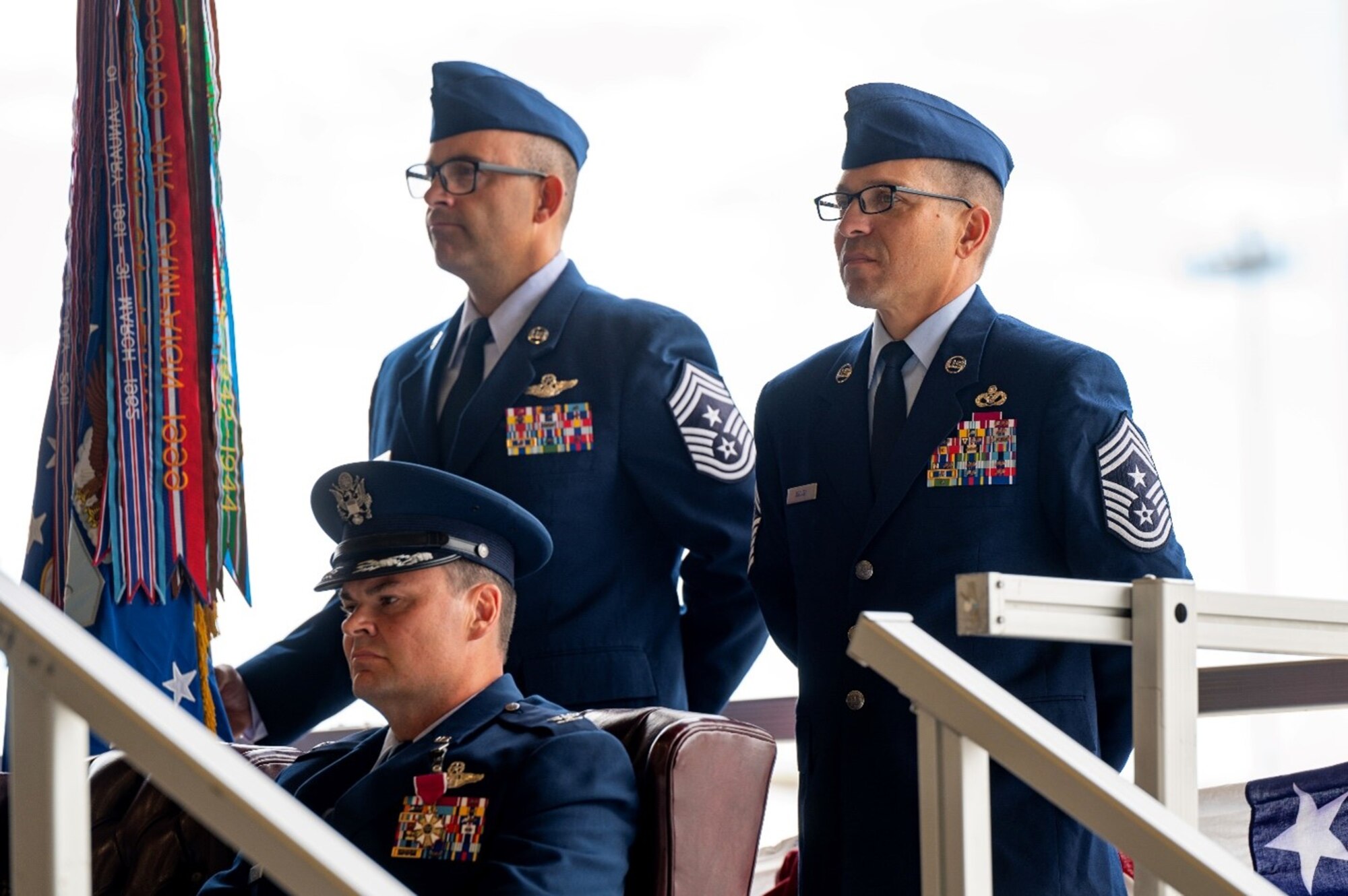 Military members stand in formation