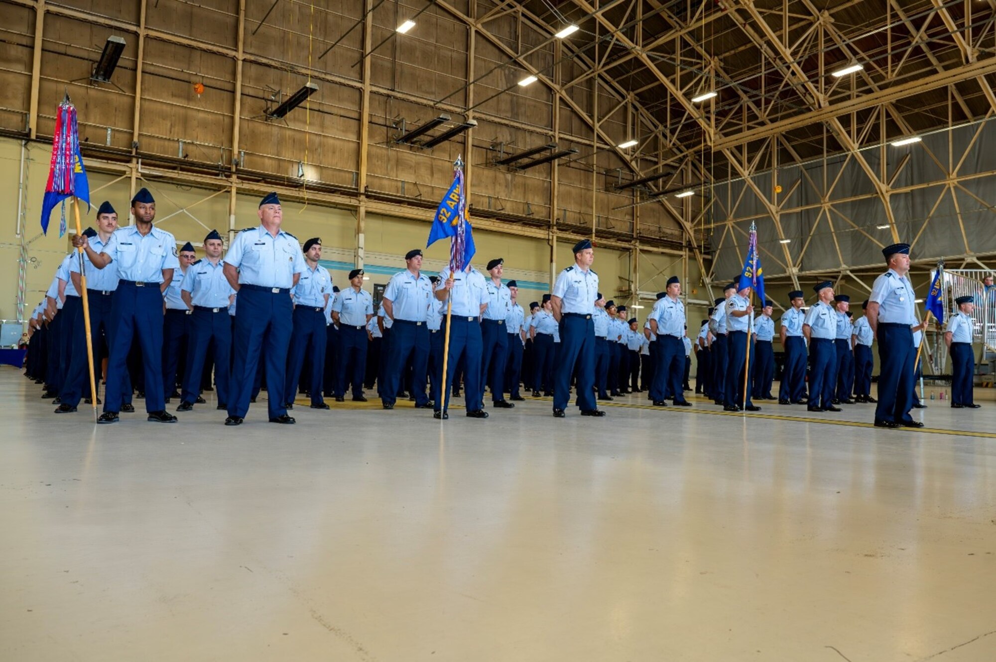 Military members stand in formation.