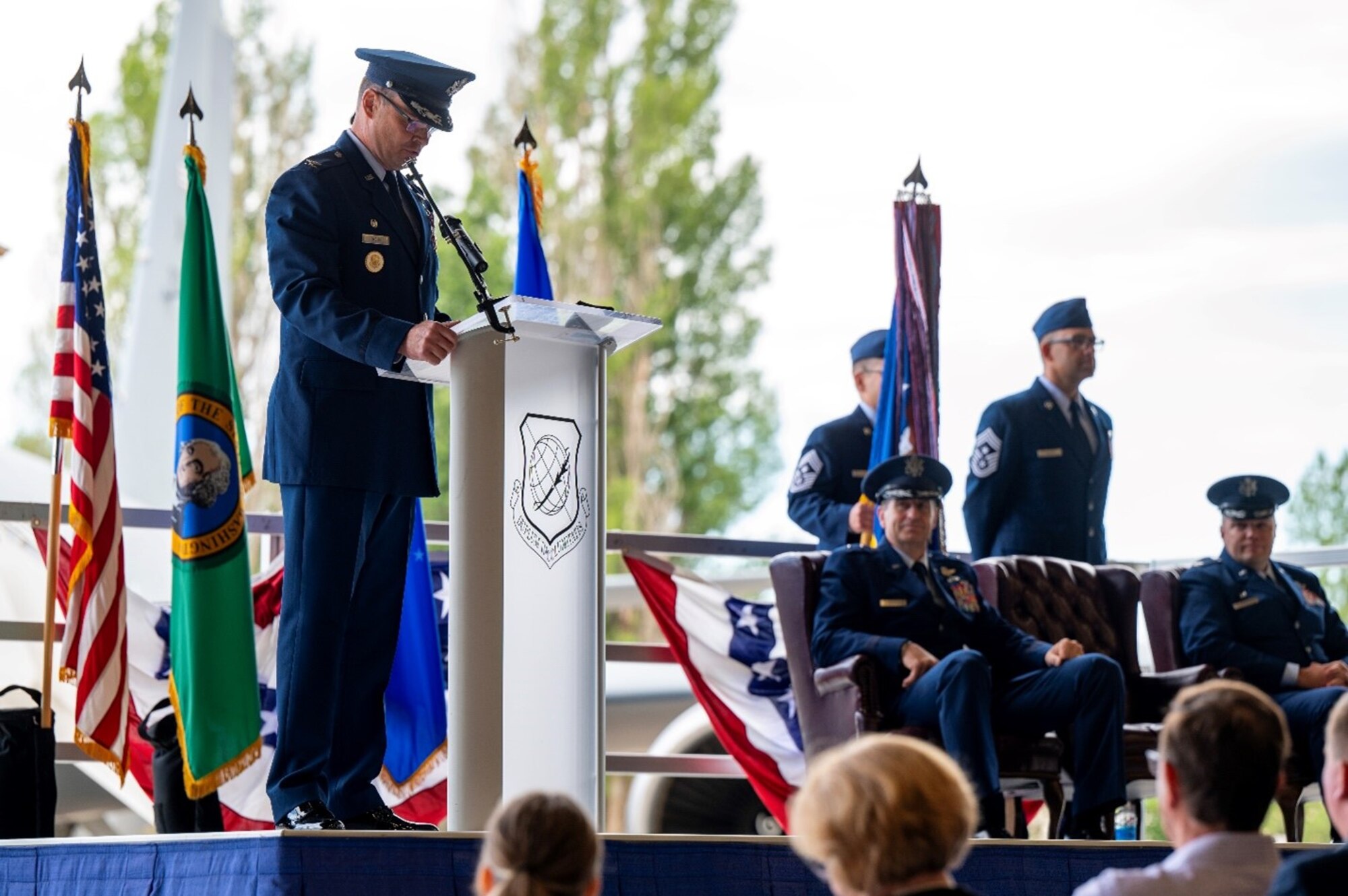 a military member gives remarks