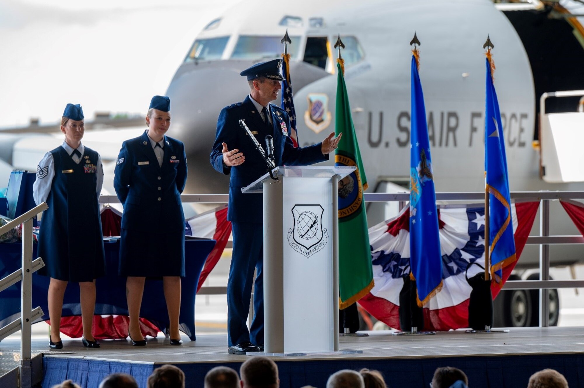 A military member gives remarks