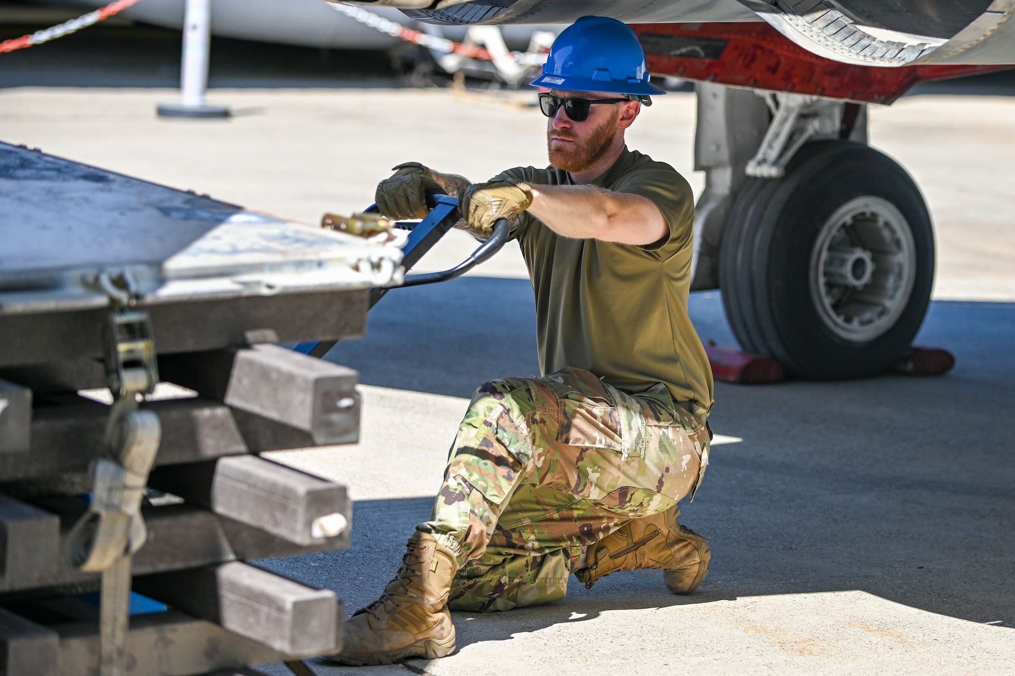 Airman pulls platform under F-4