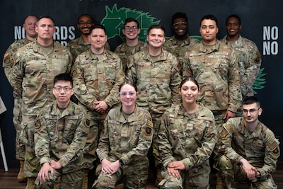 U.S. Air Force Airmen with the 7th Communications Squadron infrastructure section pose for a team photo at Dyess Air Force Base, Texas, June 26, 2024. The team was recognized for their completion of a base-wide network improvement, spanning over nine months. The team overcame the challenge of the manpower and workload involved with maintaining normal base operations while simultaneously replacing and improving network hardware. (U.S. Air Force photo by Airman 1st Class Jade M. Caldwell)