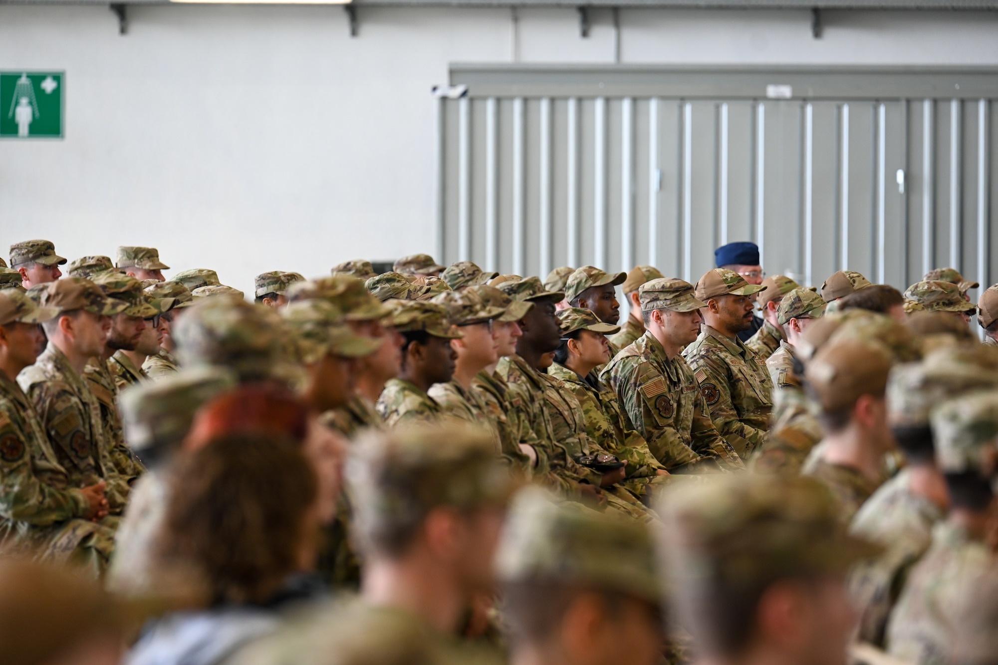 Personnel attend a change of command ceremony at Ramstein Air Base, Germany, July 3, 2024.