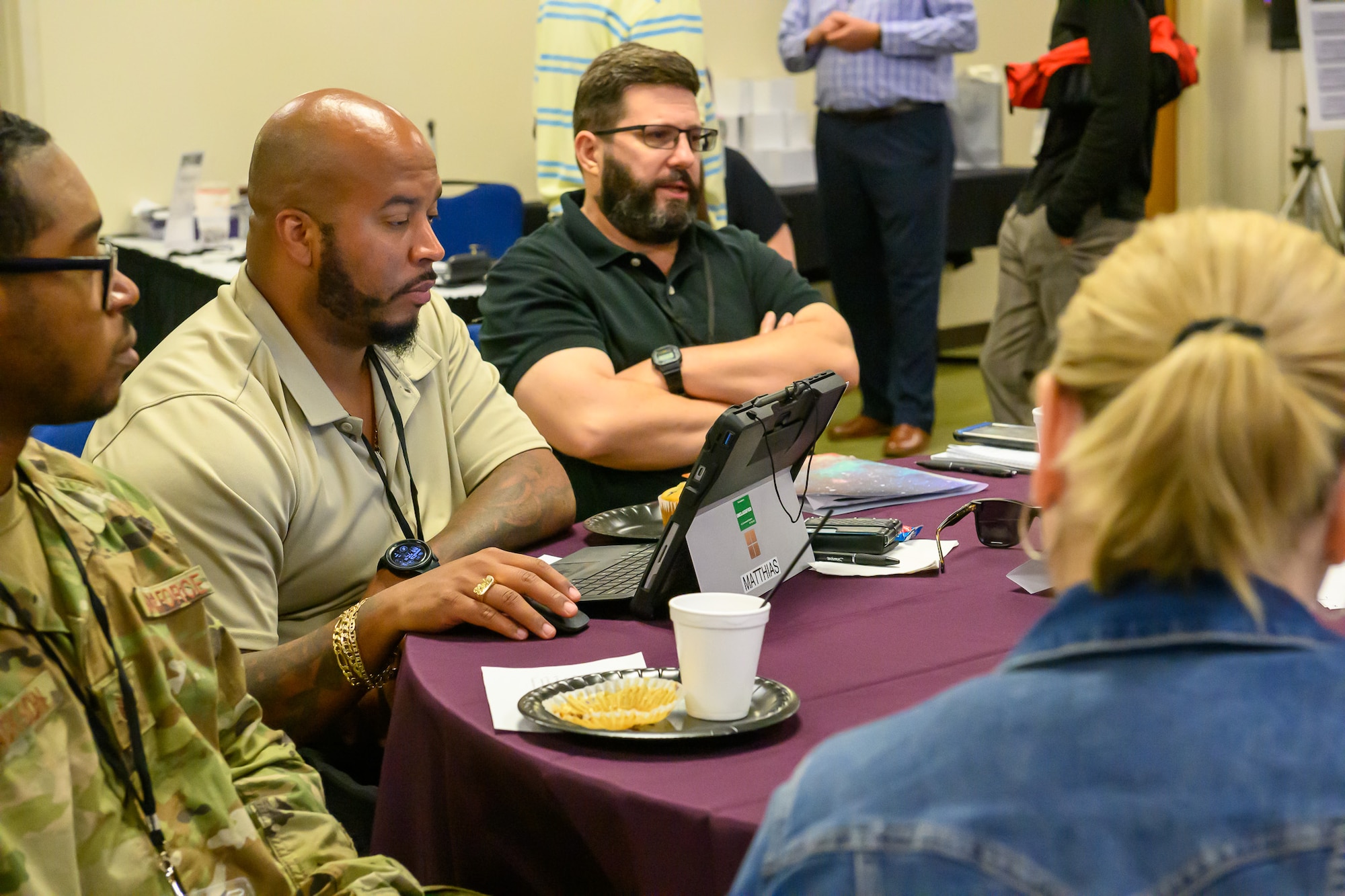 Shots of individuals communicating and participating in the Developers' Summit 2024