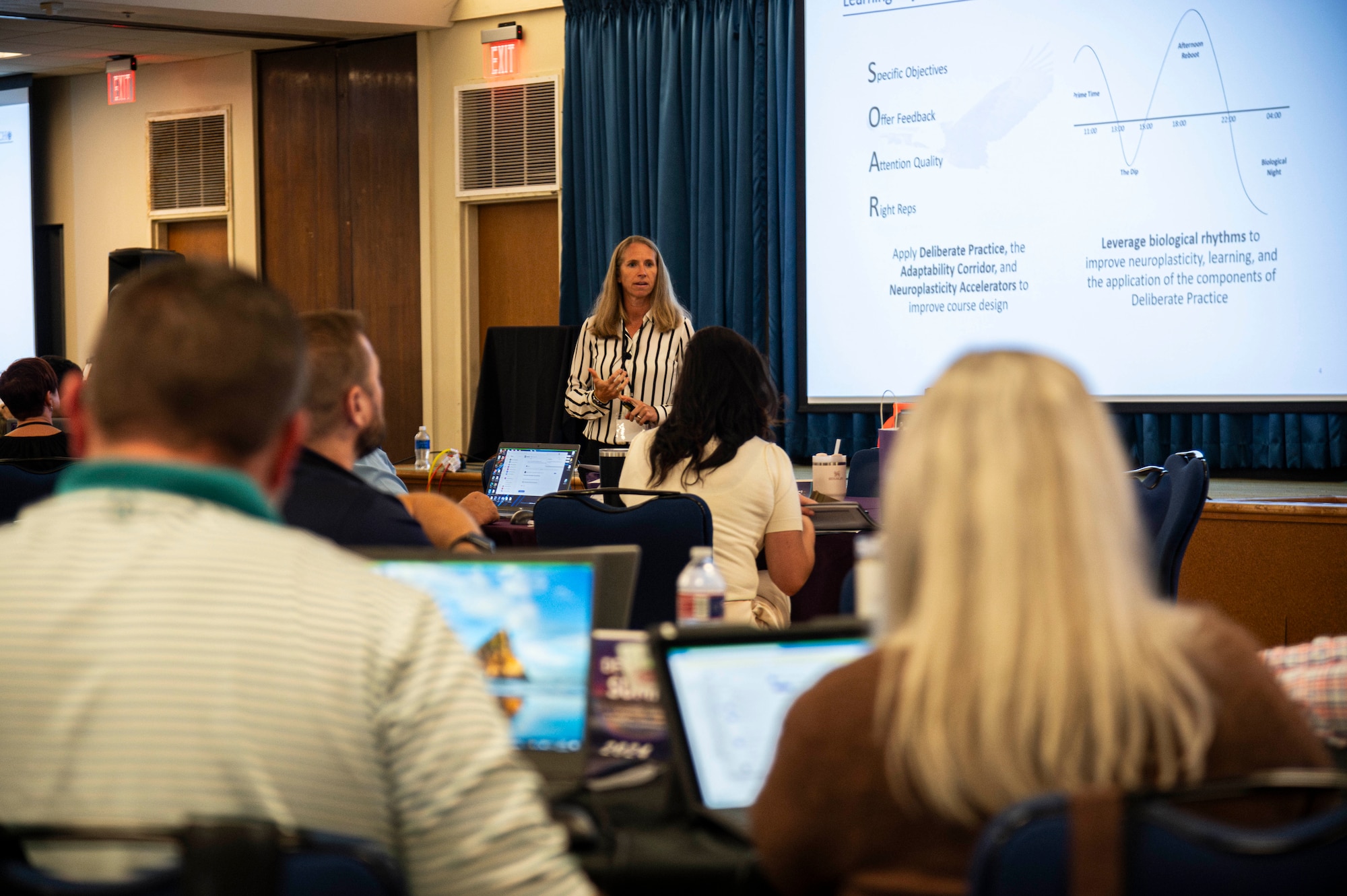 Shots of individuals communicating and participating in the Developers' Summit 2024