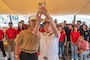 Rear Adm. Nancy Lacore, Commandant, Naval District Washington, takes a selfie with future Sailors and Marines aboard historic ship USS Constellation following an enlistment ceremony, June 14, 2024, as part of Maryland Fleet Week in Baltimore. Maryland Fleet Week and Flyover Baltimore is the city’s celebration of the sea services. This year marks the City of Baltimore's fourth time hosting Navy Fleet Week. Maryland Fleet Week and Flyover Baltimore provides an opportunity for the citizens of Maryland and the City of Baltimore to meet Sailors, Marines, and Coast Guardsmen, as well as see firsthand the latest capabilities of today’s maritime services. More than 2,300 sea service members are expected to participate this year. (U.S. Navy photo by Mass Communication Specialist 1st Class Mark Thomas Mahmod)